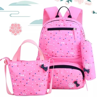 Gli zainhi per le ragazze istruiscono i bambini che svegli lo zaino Bookbags ha isolato la scatola di pranzo ha messo la borsa
