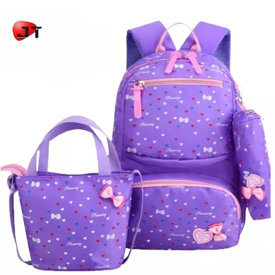 Gli zainhi per le ragazze istruiscono i bambini che svegli lo zaino Bookbags ha isolato la scatola di pranzo ha messo la borsa